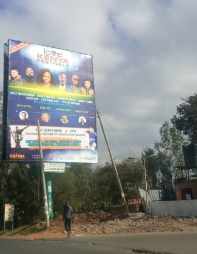 September 2023, On The Go Ministries festival billboard featuring Keith Cook, located roadside in Machakos, Kenya.