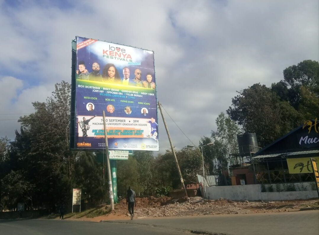 September 2023, On The Go Ministries festival billboard featuring Keith Cook, located roadside in Machakos, Kenya.